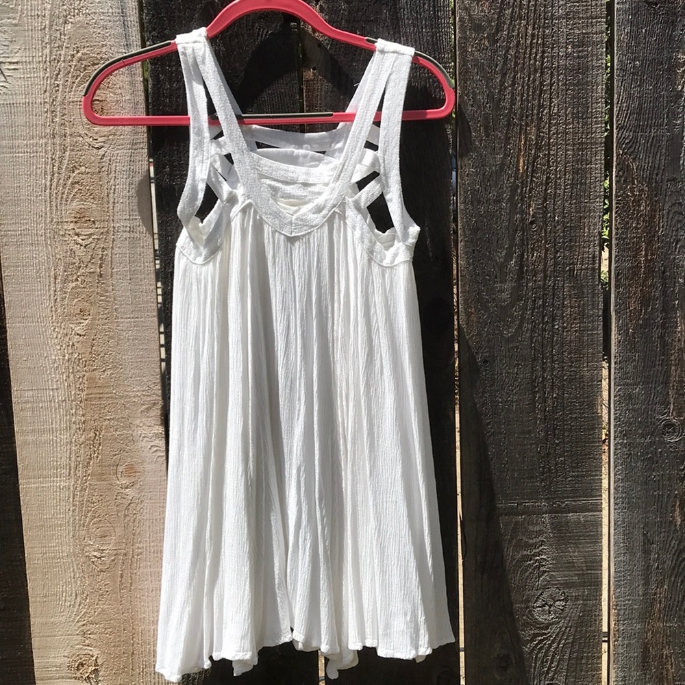 Short white dress with cut outs